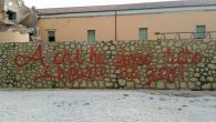 Murales di fianco al tendone Caritas