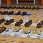 I feretri delle vittime raccolti nel Palazzetto dello Sport di Crotone (foto Ansa /Sir)